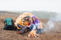 Happy family looking at burning fire Royalty Free Stock Photo