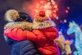 Happy family looking fireworks in the evening sky. fireworks new year, christmas. Crazy 2020 is over, it`s 2021 Royalty Free Stock Photo