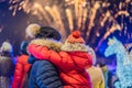 Happy family looking fireworks in the evening sky. fireworks new year, christmas Royalty Free Stock Photo