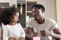 Happy family love bonding, African father and daughter girl with curly hair enjoy spending time together at home, little child kid Royalty Free Stock Photo