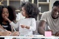 Happy family love bonding, African father and two daughter girls with curly hair enjoy spending time together at home, little Royalty Free Stock Photo