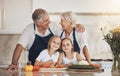 Happy family, love and grandparents with grandchildren cooking in a kitchen with vegetables. Food, learning and kids Royalty Free Stock Photo