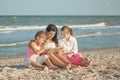 Happy family. Mother, youngest daughter and an seventeen-year-old daughter with Down syndrome. Royalty Free Stock Photo