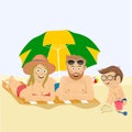 Happy family lying on the tropical beach under umbrella Royalty Free Stock Photo