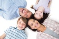 Happy family lying on white background Royalty Free Stock Photo