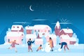 Happy family making snowman at Christmas evening and night, playing snowballs on street Royalty Free Stock Photo