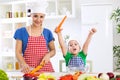 Happy family making vegetables vegetarian meal Royalty Free Stock Photo