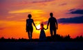 Happy family on meadow at summer