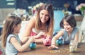 Happy Family mom daughter save money piggy bank future investment savings Royalty Free Stock Photo