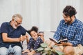 Happy family moment elder with child little girl and son at home living room happiness moment