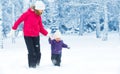 Happy family mother and baby girl daughter run, walk and playing Royalty Free Stock Photo