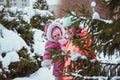 Happy family mother and baby girl daughter in winter outdoors Royalty Free Stock Photo