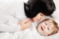 Happy family. Mother with baby playing and smiling Royalty Free Stock Photo