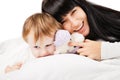 Happy family. Mother with baby playing and smiling Royalty Free Stock Photo