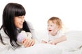 Happy family. Mother with baby playing and smiling Royalty Free Stock Photo