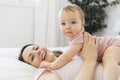 happy family. Mother and baby playing and smiling under a blanket Royalty Free Stock Photo