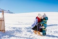 Happy family mother and child daughter having fun, playing at winter walk outdoors Royalty Free Stock Photo