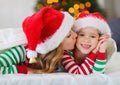 Happy family mother and child daughter in pajamas opening gifts Royalty Free Stock Photo