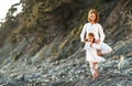 Happy family mother and child doing yoga, meditate in lotus position on beach Royalty Free Stock Photo