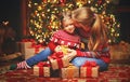 Happy family mother and child girl with Christmas present Royalty Free Stock Photo