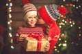 Happy family mother and child girl with Christmas present Royalty Free Stock Photo