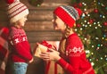 Happy family mother and child girl with Christmas present Royalty Free Stock Photo