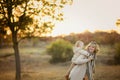 Happy family: mother and child little daughter play cuddling on autumn walk in nature outdoors Royalty Free Stock Photo