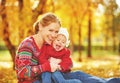 Happy family: mother and child little daughter play cuddling on Royalty Free Stock Photo