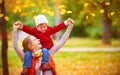 Happy family: mother and child little daughter play cuddling on Royalty Free Stock Photo