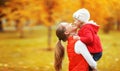 Happy family. mother and child little daughter play kissing on a Royalty Free Stock Photo