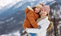 Happy family mother and child playing on winter walk Royalty Free Stock Photo