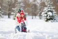 Happy family mother and child on winter walk drinking tea Royalty Free Stock Photo