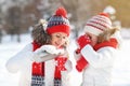 Happy family mother and child on winter walk drinking tea Royalty Free Stock Photo