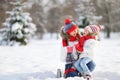 Happy family mother and child on winter walk drinking tea Royalty Free Stock Photo