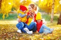 Happy family mother and children on autumn walk Royalty Free Stock Photo