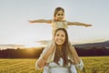 Happy family mother with children daughter on nature sunset Royalty Free Stock Photo
