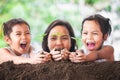 Happy family mother and daughter holding young tree Royalty Free Stock Photo