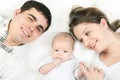 Happy family - mother, father and baby Royalty Free Stock Photo