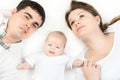 Happy family - mother, father and baby Royalty Free Stock Photo