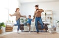 Happy family mother father and child daughter dancing at home Royalty Free Stock Photo