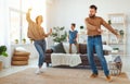 Happy family mother father and child daughter dancing at home Royalty Free Stock Photo