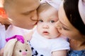 Happy family: mother father and child daughter on nature on sunset Royalty Free Stock Photo