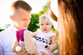 Happy family: mother father and child daughter on nature on sunset Royalty Free Stock Photo