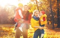 Happy family mother, father and children on an autumn walk Royalty Free Stock Photo