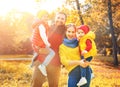 Happy family mother, father and children on an autumn walk Royalty Free Stock Photo