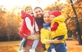 Happy family mother, father and children on an autumn walk Royalty Free Stock Photo