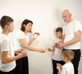 middle aged couple enjoying time with three children over white background happy family mother, father and children Royalty Free Stock Photo