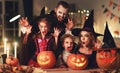 Happy family mother father and children in costumes and makeup on  Halloween Royalty Free Stock Photo