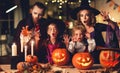 Happy family mother father and children in costumes and makeup on  Halloween Royalty Free Stock Photo