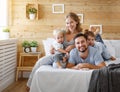 Happy family mother father and children daughter and son in bed Royalty Free Stock Photo